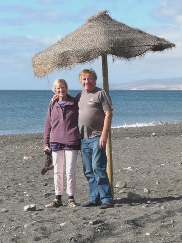 2014-02-12_1016__12538A Rosie & Adrian under beach umbrella at Tarajalejo, Fuerteventura